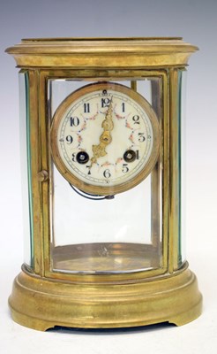 Lot 454 - Late 19th or early 20th Century French oval four glass mantel clock