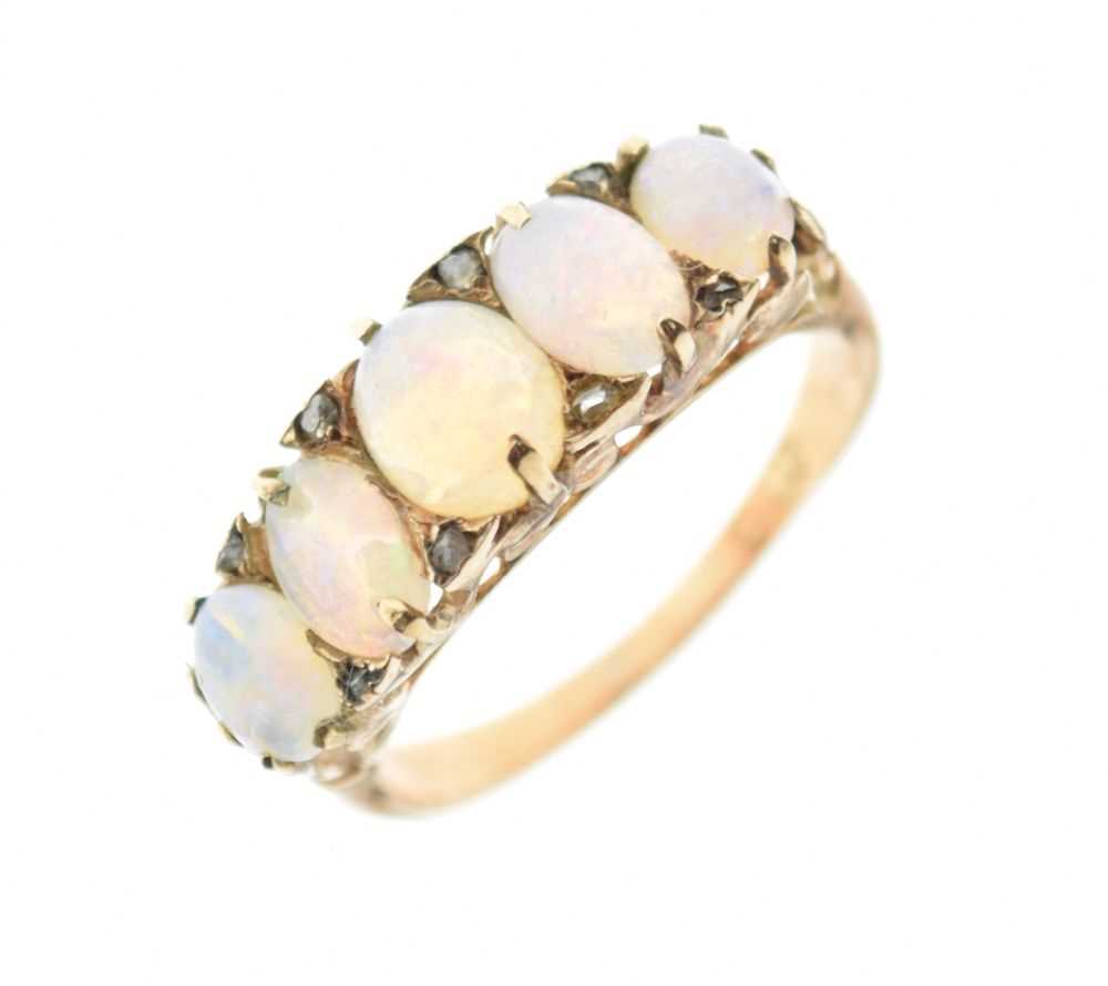Lot 14 - '18ct' gold five-stone opal ring