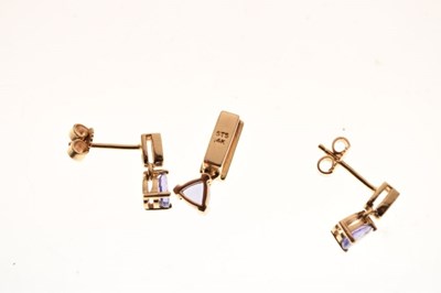 Lot 69 - Pair of 14k, tanzanite and diamond set ear studs, and a matching pendant