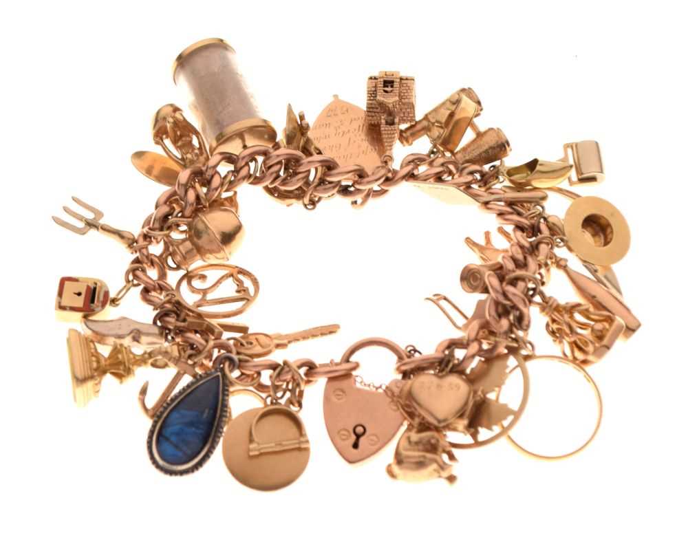 Lot 48 - 9ct gold curb-link charm bracelet, attached various charms