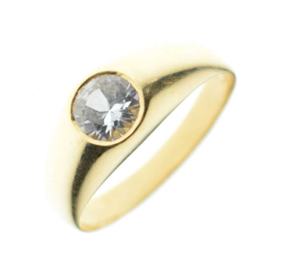 Lot 3 - Gentleman's yellow metal dress ring set single white sapphire, stamped '18K'