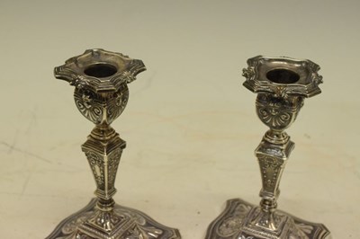 Lot 139 - Pair of late Victorian silver candlesticks