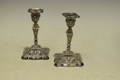 Lot 139 - Pair of late Victorian silver candlesticks