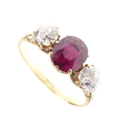 Lot 15 - Ruby and diamond three-stone ring