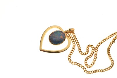 Lot 32 - '9ct' gold opal set ring and an unmarked yellow metal heart-shaped pendant and chain