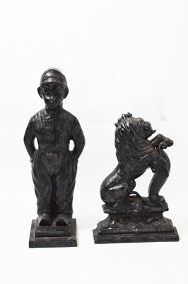 Lot 735 - Two cast iron doorstops