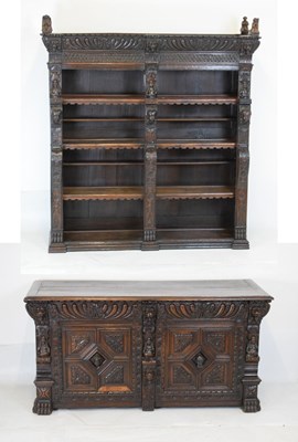 Lot 579 - Carved oak 'Jacobethan' bookcase on cabinet