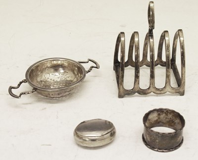 Lot 160 - George V silver wine strainer, a napkin ring and oval box