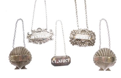 Lot 170 - Pair of Elizabeth II silver shell-shaped 'Sherry' decanter label, plus three others