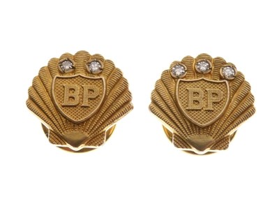 Lot 94 - Two 9ct gold diamond set 'BP' studs