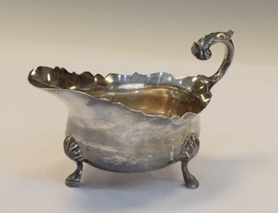 Lot 158 - George V silver sauce boat with scroll handle