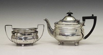 Lot 163 - Mappin & Webb - Early 20th Century silver teapot and similar style sugar bowl