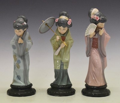 Lot 382 - Lladro - Three porcelain Geisha figures