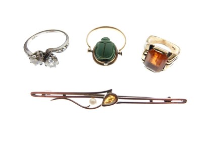Lot 46 - Three various dress rings, and a bar brooch