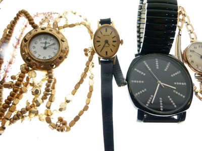 Lot 140 - Lady's gold watch, and two fashion watches
