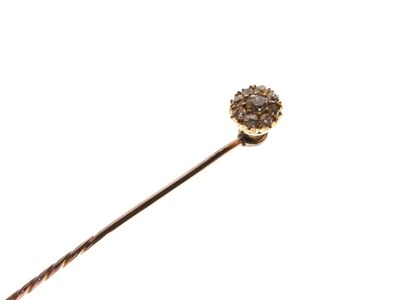Lot 70 - Stick pin set old-cut diamond cluster