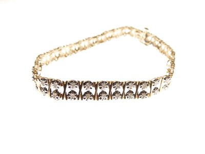 Lot 16 - 9ct gold double-row diamond set bracelet