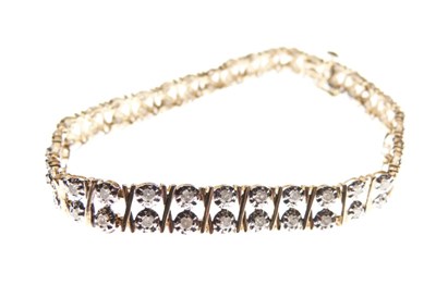 Lot 16 - 9ct gold double-row diamond set bracelet
