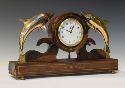 Lot 524 - Brass-inlaid rosewood dolphin mantel clock