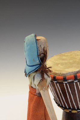 Lot 255 - Small tribal hand drum and wooden doll