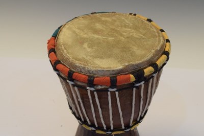 Lot 255 - Small tribal hand drum and wooden doll