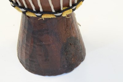 Lot 255 - Small tribal hand drum and wooden doll