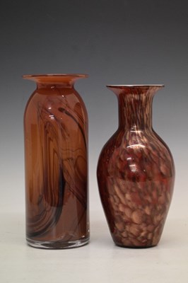 Lot 325 - Anthony Stern (1944-2022) - Red ground glass vase with swirled decoration and another vase