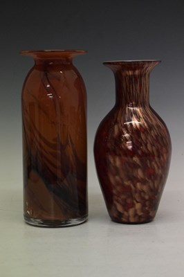 Lot 325 - Anthony Stern (1944-2022) - Red ground glass vase with swirled decoration and another vase