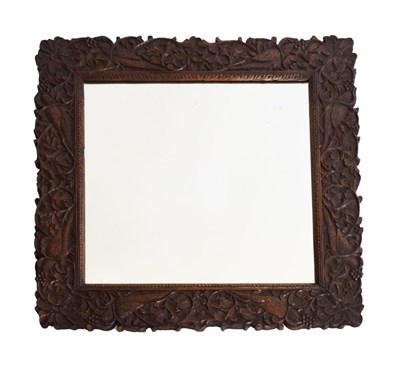 Lot 619 - Carved hardwood wall mirror