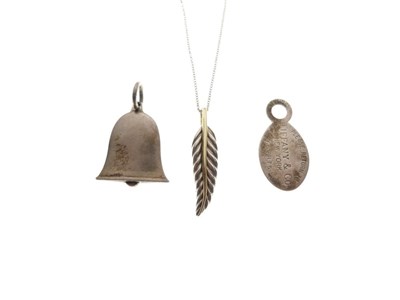 Lot 84 - Tiffany & Co - A silver and gold feather pendant