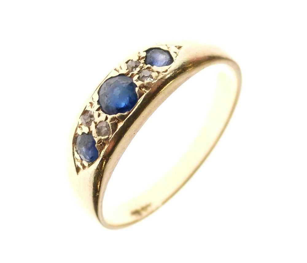 Lot 17 - Sapphire and diamond dress ring
