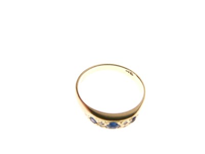 Lot 17 - Sapphire and diamond dress ring