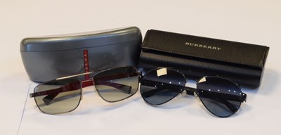 Lot 259 - Pair of gentleman's Burberry polarised sunglasses, together with a pair of Prada sunglasses