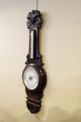 Lot 522 - Early 20th Century carved oak aneroid barometer