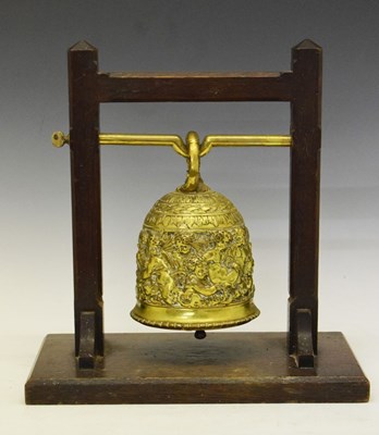 Lot 137 - Renaissance Revival bronze bell,on oak stand