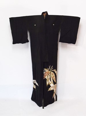 Lot 202 - Japanese kimono or robe, decorated with floral roundels