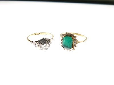 Lot 11 - Illusion set diamond cluster ring. and a dress ring