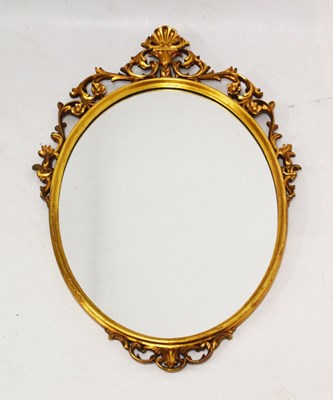 Lot 622 - Italian ornate gilt oval wall mirror