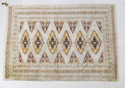 Lot 511 - Cream ground wool rug