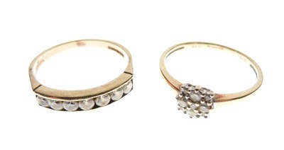 Lot 12 - 9ct gold diamond cluster ring, together with a 9ct gold half eternity ring set seven white stones