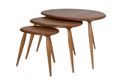 Lot 653 - Lucian Ercolani for Ercol Furniture - Nest of three light elm 'Pebble' tables