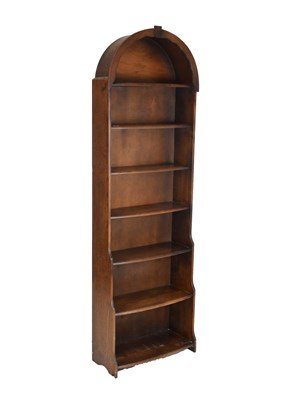 Lot 617 - Ercol-style waterfall canopy bookcase