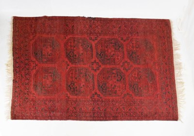 Lot 517 - Afghan wool rug