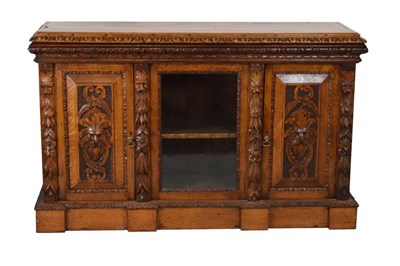 Lot 574 - Late Victorian carved oak side cabinet