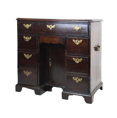 Lot 707 - Small George III mahogany kneehole desk