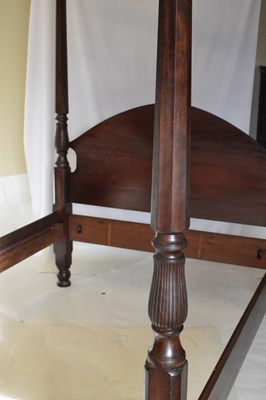 Lot 550 - Mahogany four-poster bed