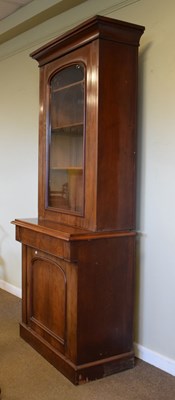 Lot 642 - Victorian mahogany glazed door bookcase on cabinet