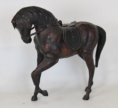 Lot 299 - Leather-covered realistic model of a horse