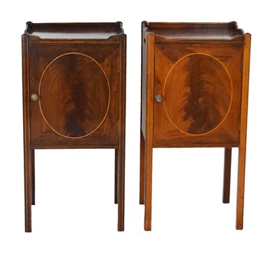 Lot 585 - Pair of early 20th century inlaid mahogany bedside cabinets