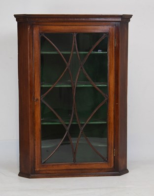 Lot 617 - Early 19th century astragal glazed mahogany hanging corner cupboard